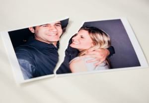 Photograph of couple ripped in half