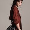 Carteira estilo saco com tachas - Mango: 25,99€